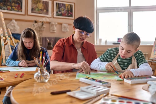 Vista previa: Teacher Children with Disability Enjoying Painting in Art Studio