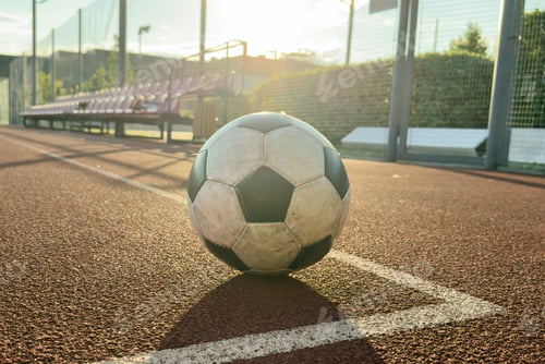 Preview: Traditional soccer ball on soccer playground
