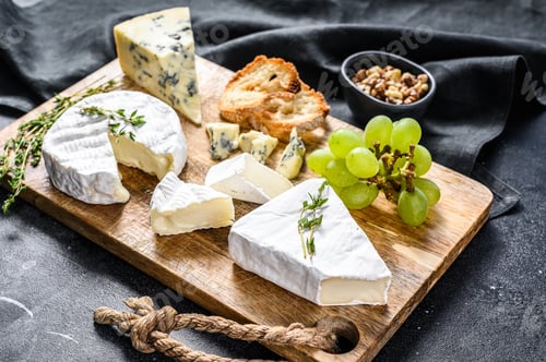 Preview: Cheese Board with French Camembert, brie and blue cheese, grapes and walnuts.