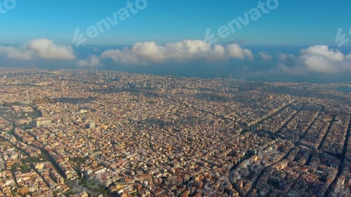 Preview: Barcelona City above the clouds and fog, Eixample residential famous urban grid