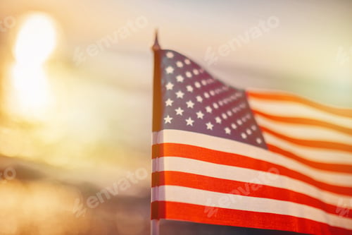 Preview: Usa national America flag at seaside background as symbol of democracy us memorial day 4th of july