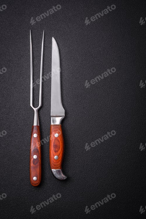 Preview: Kitchen knife and fork made of steel with copy space