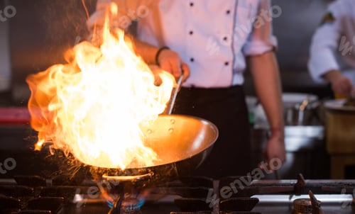 Preview: Chef doing flambe on food