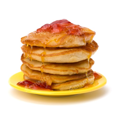 Delicious Stack of Pancakes with Jam and Syrup