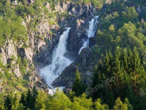 Preview: View to beautiful waterfall from Buerbreen carpark in Norway