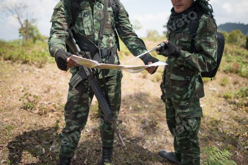 Preview: Soldier ready his weapon and View map in the forest