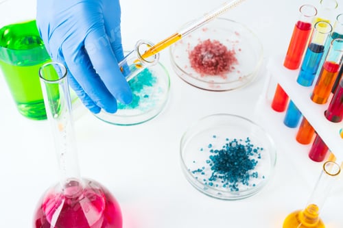 Preview: Chemical research in Petri dishes done by a scientist close up