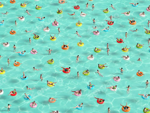 Preview: people relaxing on donut in the pool holidey idyllic. High view from above.