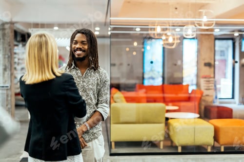 Preview: Colleagues smiling and talking