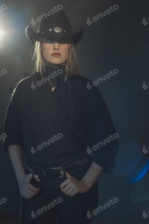 Preview: Blonde Cowgirl In Black Shirt And Hat.