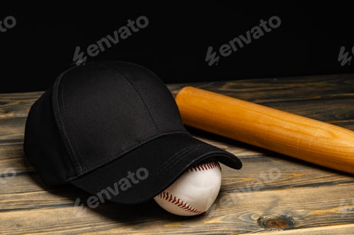 Preview: Baseball cap, ball and bat on wooden background