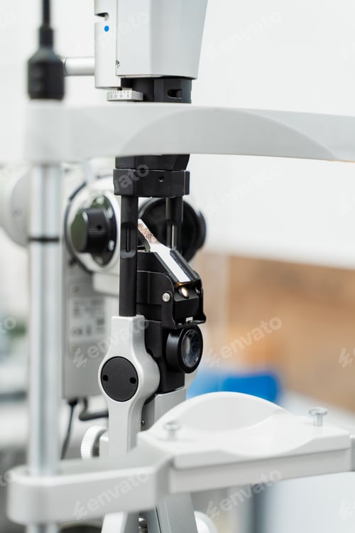 Preview: Ophthalmologist slit lamp exam for eyes and cornea check in clinic setting
