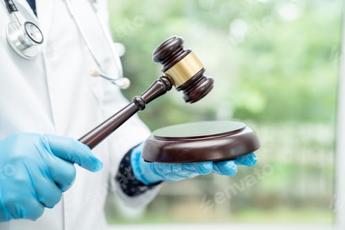 Preview: Doctor holding judge gavel, forensic medicine, medical law and crime justice concept.