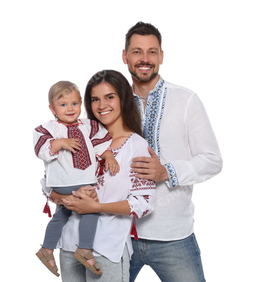 Preview: Happy family in Ukrainian national clothes on white background
