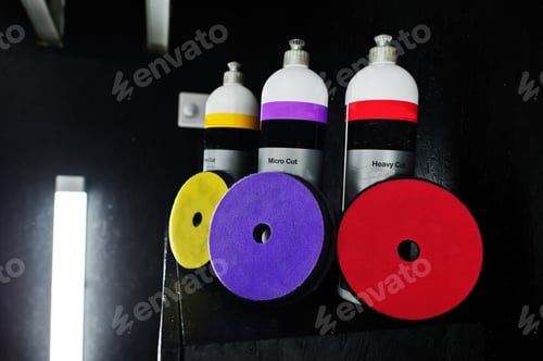 Preview: Car polishing chemistry bottles at garage.