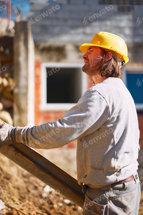 Preview: Construction Worker On A Heavy Site Doing Hard Work.