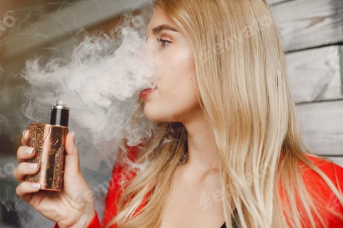 Preview: Stylish young girl in a city with vape