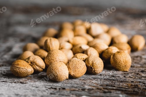 Preview: Almonds in shell on a Wooden Table