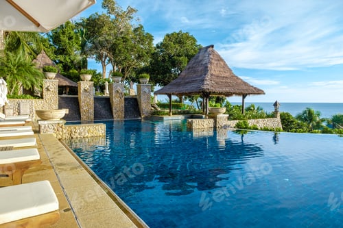 Preview: Koh Lanta Thailand, luxury beach chairs by the swimming pool of an luxury hotel in Thailand