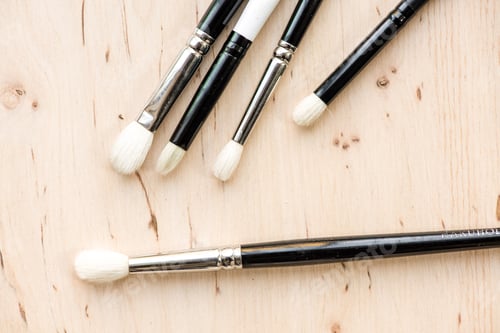 Preview: Assorted make up brushes, top view.