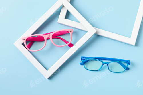 Preview: Child eyeglasses over pastel background. Optical store, glasses selection for kids