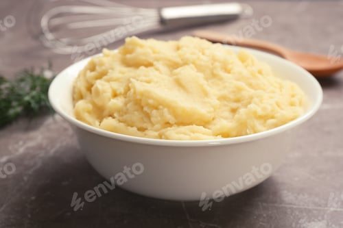Preview: Bowl with mashed potatoes on grey table