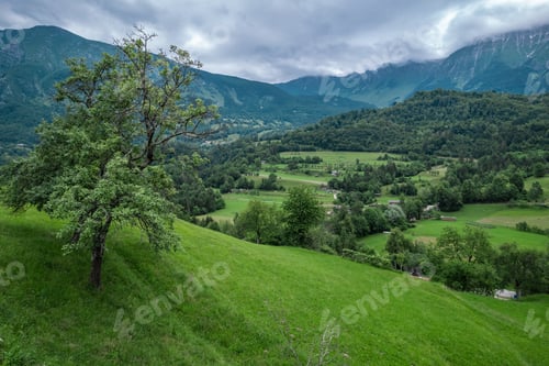 Preview: Drežnica village, Slovenia. Drone aerial view. Picturesque rural green landscape