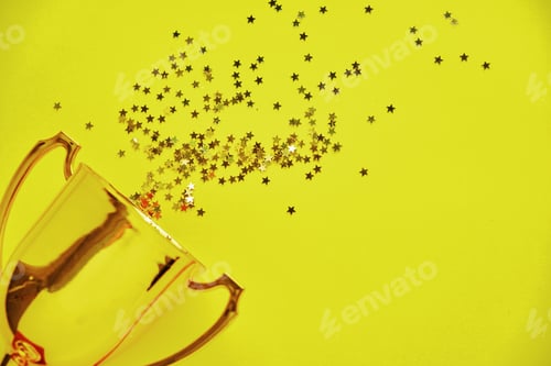 Preview: Champion gold cup trophy on yellow background. minimalism style
