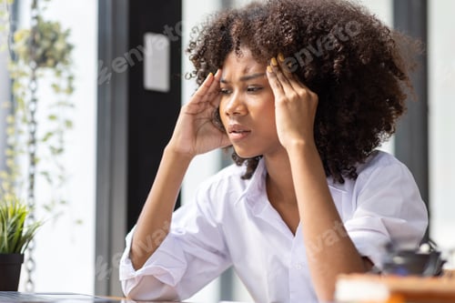 Preview: Portrait of tired young business african american woman work with documents tax laptop computer in