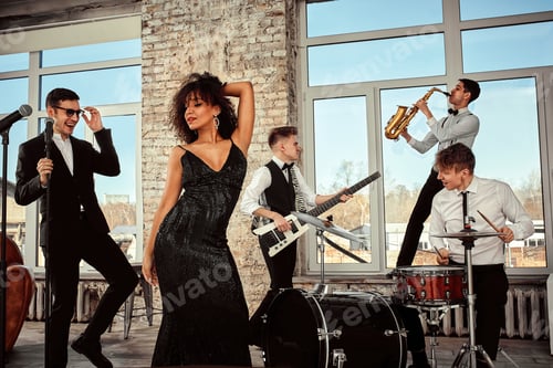 Preview: Young international musicians, a band performing on the loft stage. The concept of music, hobby