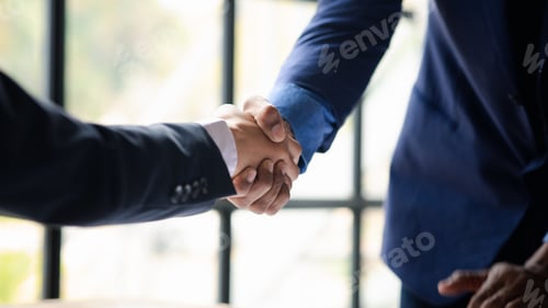 Preview: Close-up two business men holding hands, Two businessmen are agreeing on business together and shaki