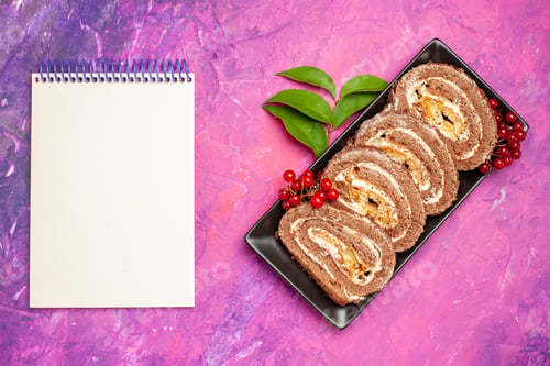 Preview: top view yummy biscuit rolls on a pink background pie dessert biscuit cake