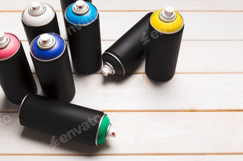 Preview: Spray paint cans close up creative photo.