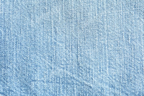 Preview: Texture of blue jeans as background, space for text