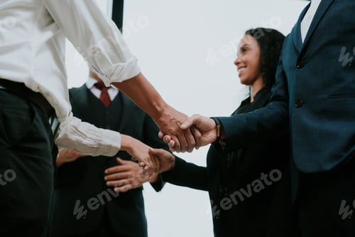 Preview: professional business people shaking hands in the office. Finishing successful meeting