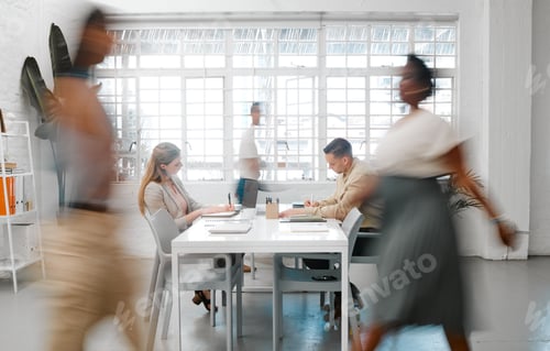Preview: Blurred designers, marketing or freelance professionals working together in a modern office. Busine