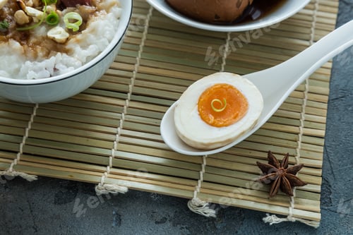 Preview: Cutted tea egg with star anise on bamboo mat