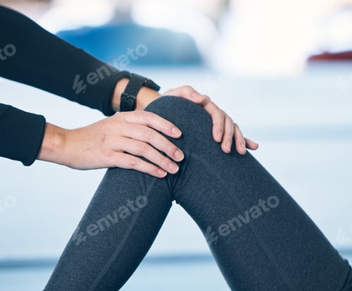 Preview: Physiotherapy, hands and therapist working on knee for muscle movement or motion at clinic. Rehabil