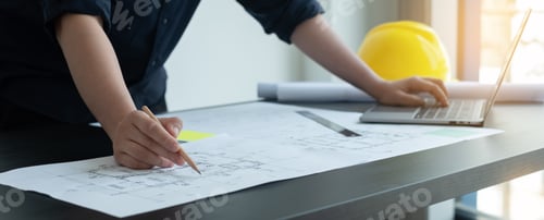 Preview: Architects or engineers working construction and drawing construction plans, printing, writing