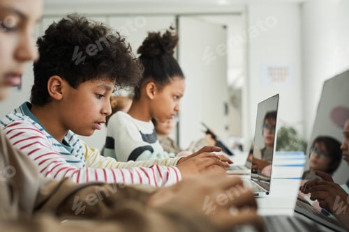 Preview: Group of Kids Studying IT in Class
