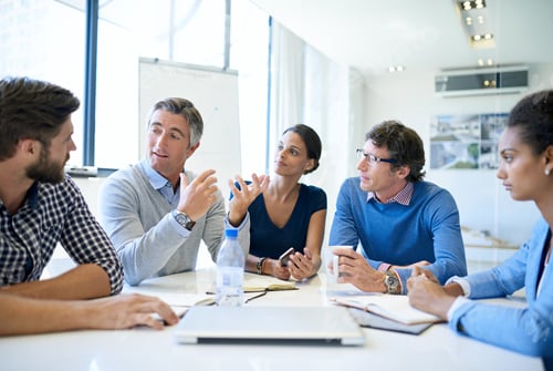 Vista previa: Shot of a group of businesspeople discussing work during a boardroom meeting