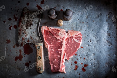 Preview: Raw red steak with salt and rosemary