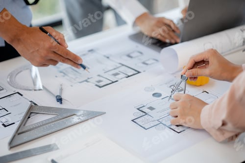 Preview: A group of architects designing buildings and houses is having a meeting.