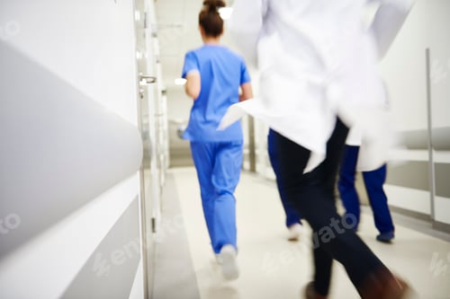 Preview: Team of doctors running in a hurry