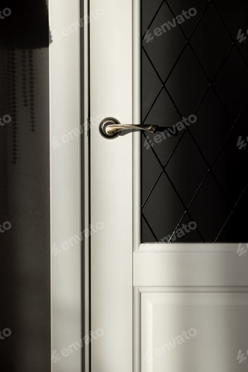 Preview: The part of the white door illuminated by a strip of light