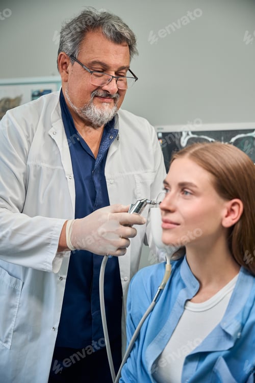 Preview: Doctor performs tuning fork test with patient