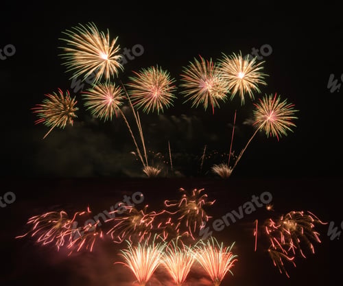 Preview: Fireworks festival display at night. Variety of fireworks in celebration. Happy New Year.
