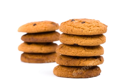 Preview: Stacks of Delicious Chocolate Chip Cookies on White
