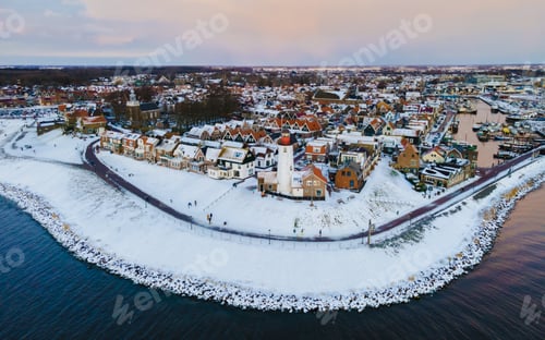 Preview: Urk lighthouse during winter with snow in the Netherlands