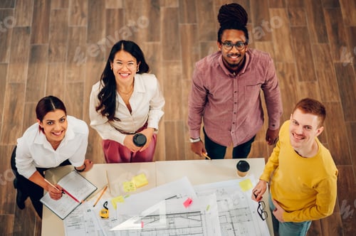 Preview: Multiracial team of engineers or architects having a meeting in an office